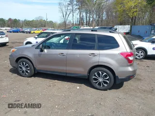 2014 Subaru Forester 2.5i Premium with VIN JF2SJAEC4EH421695, listed as a IAAI auction lot 42112832 with 188,793 mi miles. Bid and sale history available at carsss.com. Image 14.