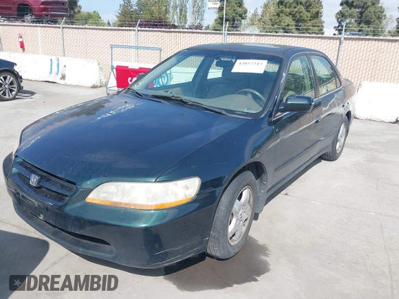 1998 Honda Accord EX z VIN 1HGCG1654WA030513, wystawiony jako IAAI lot #42057213 z przebiegiem 261 897 mil mil oraz . Historia ofert i sprzedaży dostępna na DreamBid. Obrazek 6.