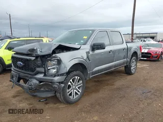 2023 Ford F-150 XL with VIN 1FTFW1E55PKF68245, listed as a IAAI auction lot 41107774 with 18,938 mi miles. Bid and sale history available at carsss.com. Image 2.