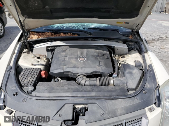 2011 Cadillac CTS Luxury z VIN 1G6DG5EY2B0115035, wystawiony jako Copart lot #55915355 z przebiegiem 144 657 mil mil oraz Szkoda całkowita • Salvage title. Historia ofert i sprzedaży dostępna na DreamBid. Obrazek 11.