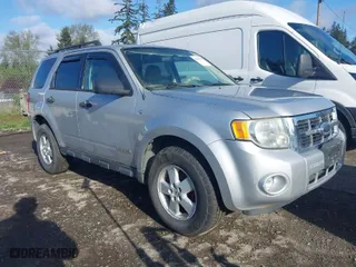 2008 Ford Escape XLT with VIN 1FMCU03148KB12768, listed as a IAAI auction lot 42024718 with 158,676 mi miles. Bid and sale history available at carsss.com. Image 1.