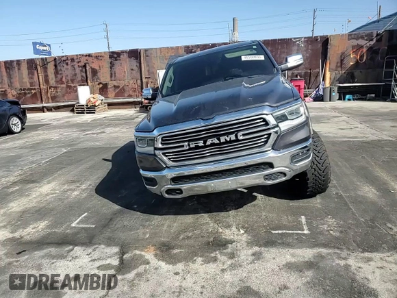 2020 Ram 1500 Laramie with VIN 1C6SRFDT1LN263036, listed as a Copart auction lot 48560655 with 130,923 mi miles and Salvage Title. Bid and sale history available at carsss.com. Image 11.