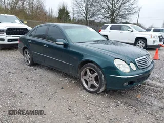 2003 Mercedes-Benz E-Class 3.2L with VIN WDBUF65J73A130214, listed as a IAAI auction lot 41731642 with 203,520 mi miles. Bid and sale history available at carsss.com. Image 1.