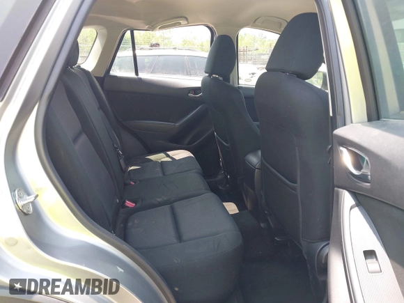 2014 Mazda CX-5 Sport with VIN JM3KE4BE9E0411177, listed as a IAAI auction lot 42411938 with 167,709 mi miles and . Bid and sale history available at DreamBid. Image 8.