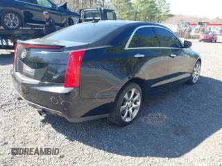 2013 Cadillac ATS Luxury z VIN 1G6AH5RX9D0173941, wystawiony jako IAAI lot #42054255 z przebiegiem 151 315 mil mil oraz . Historia ofert i sprzedaży dostępna na DreamBid. Obrazek 4.