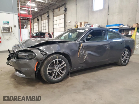2019 Dodge Charger SXT with VIN 2C3CDXJG4KH520470, listed as a Copart auction lot 51947755 with 90,876 mi miles and Salvage Title. Bid and sale history available at DreamBid. Image 1.
