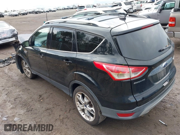 2016 Ford Escape Titanium with VIN 1FMCU9J91GUA59639, listed as a IAAI auction lot 41058369 with 138,046 mi miles. Bid and sale history available at carsss.com. Image 3.