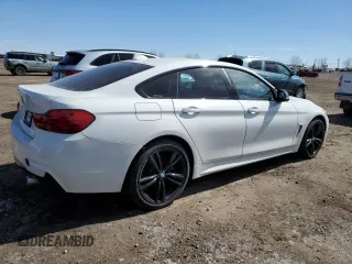 2016 BMW 4 Series 435i xDrive z VIN WBA4B3C59GG344557, wystawiony jako Copart lot #53164045 z przebiegiem 99 094 mil mil oraz Szkoda całkowita • Salvage title. Historia ofert i sprzedaży dostępna na DreamBid. Obrazek 3.
