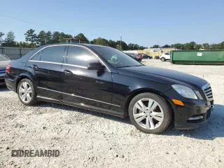 2013 Mercedes-Benz E 400 Sport with VIN WDDHF9FB8DA747401, listed as a Copart auction lot 75117584 with 235,611 mi miles and Salvage Title. Bid and sale history available at DreamBid. Image 4.