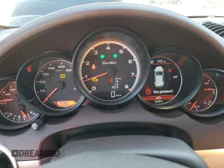 2012 Porsche Cayenne Turbo with VIN WP1AC2A26CLA82602, listed as a Copart auction lot 77752814 with 115,965 mi miles and Salvage title. Bid and sale history available at DreamBid. Image 9.