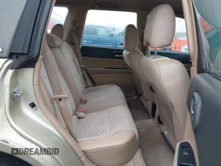 2003 Subaru Forester XS with VIN JF1SG65663H753306, listed as a IAAI auction lot 41311689 with 253,269 mi miles. Bid and sale history available at carsss.com. Image 8.
