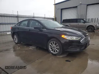 2017 Ford Fusion SE with VIN 3FA6P0H71HR396352, listed as a Copart auction lot 54869805 with 103,678 mi miles and Salvage title. Bid and sale history available at DreamBid. Image 4.
