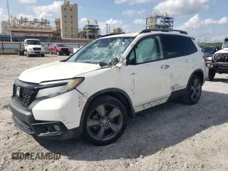 2019 Honda Passport Touring z VIN 5FNYF7H99KB001259, wystawiony jako Copart lot #54889355 z przebiegiem 101 527 mil mil oraz Nie do naprawy. Historia ofert i sprzedaży dostępna na DreamBid. Obrazek 1.