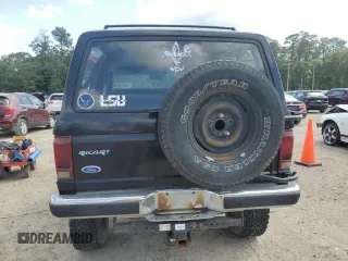 1990 Ford Bronco z VIN 1FMCU14T9LUA15536, wystawiony jako Copart lot #54391815 z przebiegiem 319 124 mil mil oraz Szkoda całkowita • Salvage title. Historia ofert i sprzedaży dostępna na DreamBid. Obrazek 6.