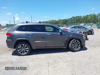 2017 Jeep Grand Cherokee Overland with VIN 1C4RJFCG2HC641791, listed as a IAAI auction lot 42566654 with 116,764 mi miles and . Bid and sale history available at DreamBid. Image 13.