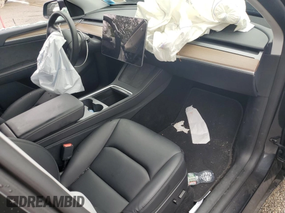 2024 Tesla Model Y Long Range с VIN 7SAYGDEE7RF180945, выставлен на аукционе Copart как лот 62059735 с пробегом Не указан миль и Списание • Salvage title. История ставок и продаж доступна на DreamBid. Изображение 8.