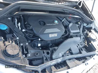 2018 BMW X1 xDrive28i with VIN WBXHT3C30J5L29757, listed as a IAAI auction lot 41879504 with 60,490 mi miles. Bid and sale history available at carsss.com. Image 10.