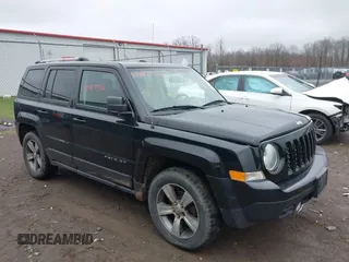 2016 Jeep Patriot Latitude with VIN 1C4NJRFB1GD523904, listed as a IAAI auction lot 42017736 with 164,705 mi miles. Bid and sale history available at carsss.com. Image 1.