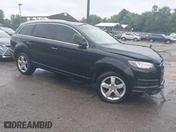 2015 Audi Q7 3.0T Premium with VIN WA1CGAFE5FD028390, listed as a IAAI auction lot 34964639 with 82,332 mi miles. Bid and sale history available at carsss.com. Image 1.