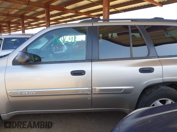 2003 GMC Envoy SLT with VIN 1GKDS13S732346641, listed as a IAAI auction lot 42111222 with 291,231 mi miles and . Bid and sale history available at DreamBid. Image 15.