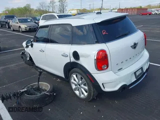 2016 MINI Countryman S with VIN WMWZC3C51GWT10458, listed as a IAAI auction lot 41878799 with 112,019 mi miles and . Bid and sale history available at DreamBid. Image 3.