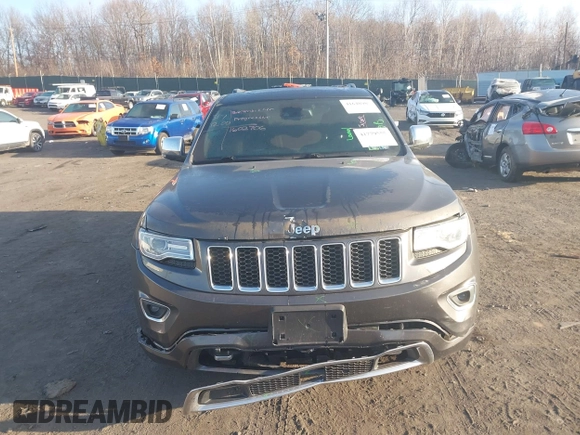 2015 Jeep Grand Cherokee Overland with VIN 1C4RJFCT3FC725239, listed as a IAAI auction lot 41779555 with 100,837 mi miles. Bid and sale history available at carsss.com. Image 12.