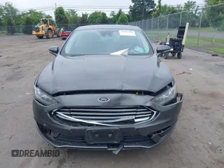 2017 Ford Fusion Hybrid SE with VIN 3FA6P0LU2HR301083, listed as a IAAI auction lot 42602798 with 89,003 mi miles and . Bid and sale history available at DreamBid. Image 12.