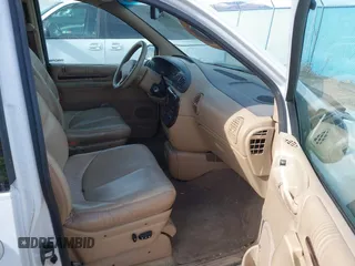 1997 Chrysler Town & Country with VIN 1C4GT64L7VB436658, listed as a IAAI auction lot 41823587 with 184,570 mi miles and . Bid and sale history available at DreamBid. Image 5.