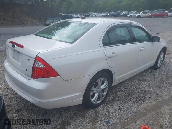 2012 Ford Fusion SE with VIN 3FAHP0HG1CR320910, listed as a IAAI auction lot 42785831 with 115,986 mi miles and . Bid and sale history available at DreamBid. Image 4.