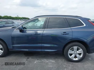 2022 Volvo XC60 Momentum z VIN YV4L12RKXN1052826, wystawiony jako IAAI lot #41869228 z przebiegiem 30 044 mil mil oraz . Historia ofert i sprzedaży dostępna na DreamBid. Obrazek 15.