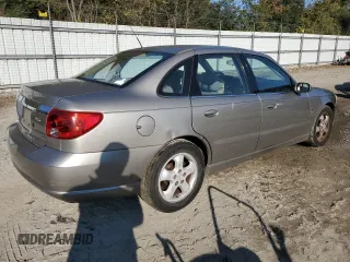 2003 Saturn LS z VIN 1G8JW54R93Y580275, wystawiony jako Copart lot #80853314 z przebiegiem 128 887 mil mil oraz Szkoda całkowita • Salvage title. Historia ofert i sprzedaży dostępna na DreamBid. Obrazek 3.