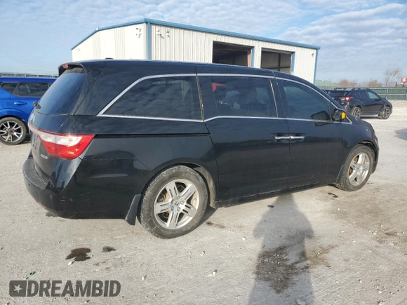 2012 Honda Odyssey Touring with VIN 5FNRL5H9XCB022284, listed as a Copart auction lot 82766824 with Not provided miles and Salvage title. Bid and sale history available at DreamBid. Image 3.
