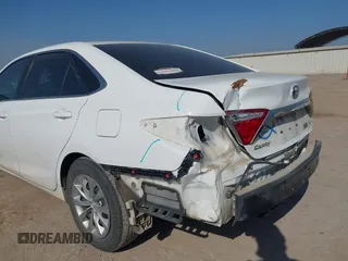 2015 Toyota Camry LE z VIN 4T1BD1FK1FU153866, wystawiony jako IAAI lot #41869793 z przebiegiem 117 352 mil mil oraz . Historia ofert i sprzedaży dostępna na DreamBid. Obrazek 6.