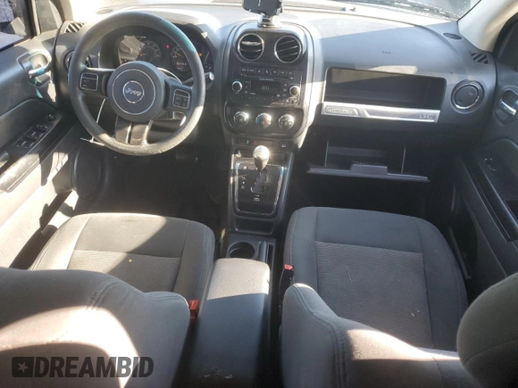 2017 Jeep Compass Sport SE with VIN 1C4NJCBA5HD124764, listed as a Copart auction lot 86616914 with 148,234 mi miles and Salvage title. Bid and sale history available at DreamBid. Image 8.