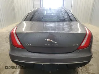 2019 Jaguar XJ Portfolio with VIN SAJWA2G71K8W19797, listed as a Copart auction lot 54133195 with 57,446 mi miles and Salvage Title. Bid and sale history available at DreamBid. Image 6.