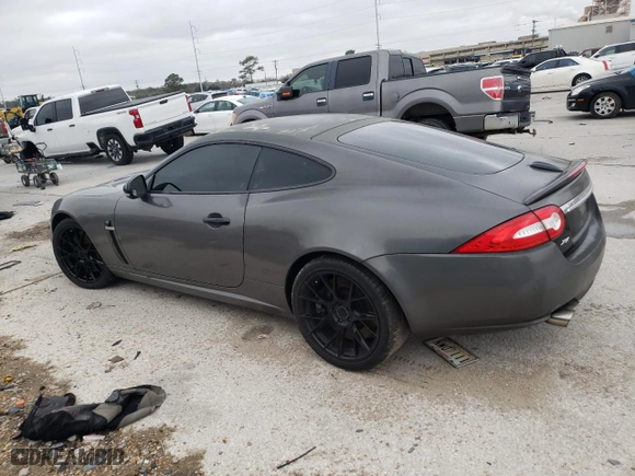2011 Jaguar XK with VIN SAJWA4DC7BMB40355, listed as a Copart auction lot 88007985 with 0 mi miles and Salvage Title. Bid and sale history available at carsss.com. Image 2.