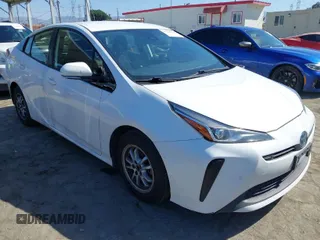 2020 Toyota Prius L Eco with VIN JTDKARFU3L3124142, listed as a IAAI auction lot 41726512 with 275,963 mi miles and . Bid and sale history available at DreamBid. Image 1.