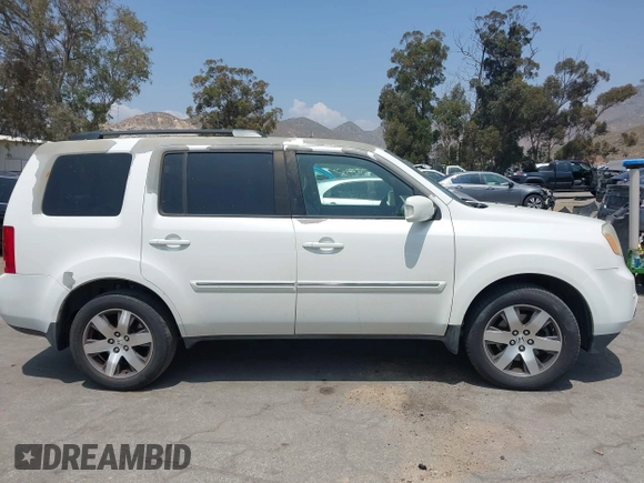 2013 Honda Pilot Touring with VIN 5FNYF3H93DB017954, listed as a IAAI auction lot 42185556 with 174,929 mi miles and . Bid and sale history available at carsss.com. Image 13.