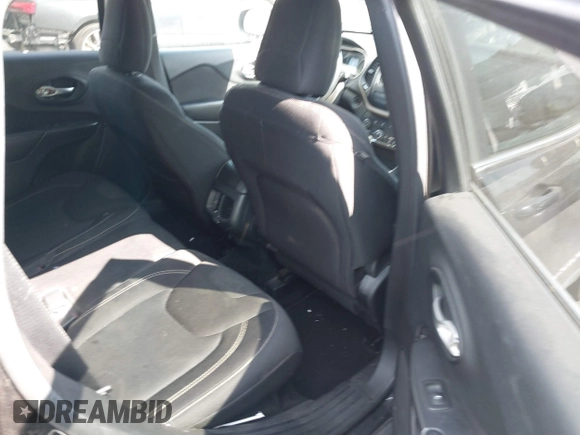 2015 Jeep Cherokee Latitude with VIN 1C4PJLCB9FW627909, listed as a IAAI auction lot 42034667 with 131,739 mi miles and . Bid and sale history available at carsss.com. Image 8.