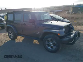 2017 Jeep Wrangler Unlimited Sahara with VIN 1C4BJWEG9HL507908, listed as a IAAI auction lot 41880209 with 99,773 mi miles. Bid and sale history available at carsss.com. Image 1.