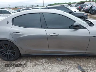 2021 Maserati Ghibli S Q4 with VIN ZAM57YTA8M1368703, listed as a IAAI auction lot 42170551 with 29,969 mi miles and . Bid and sale history available at DreamBid. Image 14.