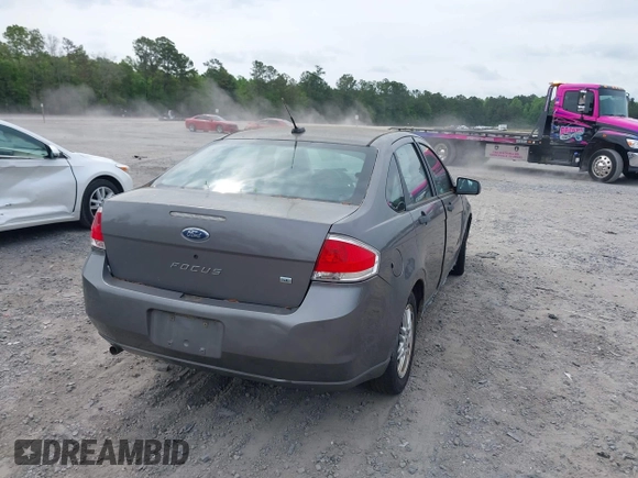 2009 Ford Focus SE with VIN 1FAHP35N49W178711, listed as a IAAI auction lot 42084721 with 203,889 mi miles. Bid and sale history available at carsss.com. Image 4.
