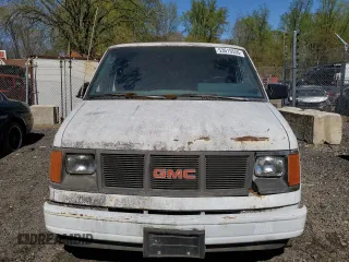 1989 GMC Safari z VIN 1GTCM15Z0KB507910, wystawiony jako Copart lot #53615555 z przebiegiem 64 389 mil mil oraz Szkody całkowita. Historia ofert i sprzedaży dostępna na DreamBid. Obrazek 5.