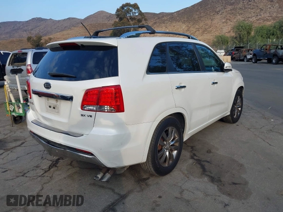 2012 Kia Sorento SX with VIN 5XYKW4A29CG224803, listed as a IAAI auction lot 41493527 with 228,065 mi miles. Bid and sale history available at carsss.com. Image 4.