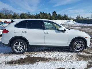 2014 Porsche Cayenne with VIN WP1AA2A2XELA95734, listed as a IAAI auction lot 41583908 with 95,751 mi miles and . Bid and sale history available at DreamBid. Image 13.