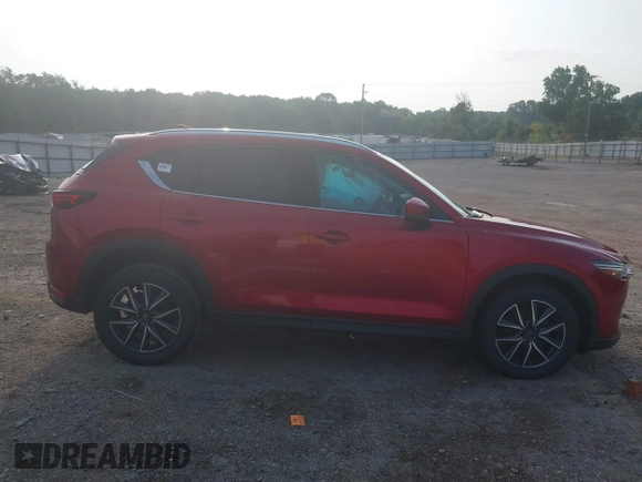 2017 Mazda CX-5 Grand Touring with VIN JM3KFADL8H0189033, listed as a IAAI auction lot 40029931 with 88,933 mi miles and . Bid and sale history available at carsss.com. Image 14.