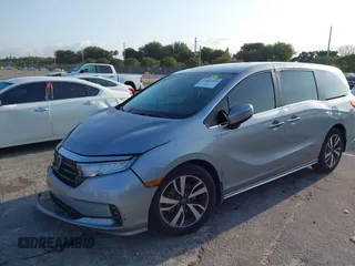 2023 Honda Odyssey Touring with VIN 5FNRL6H86PB020700, listed as a IAAI auction lot 41961098 with 66,512 mi miles and . Bid and sale history available at DreamBid. Image 17.
