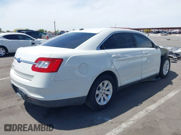 2011 Ford Taurus SE with VIN 1FAHP2DW1BG165371, listed as a IAAI auction lot 42164608 with 186,485 mi miles. Bid and sale history available at carsss.com. Image 4.