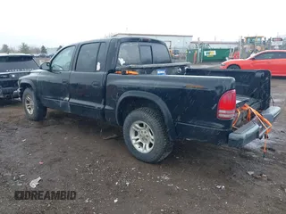 2004 Dodge Dakota Sport with VIN 1D7HL38N94S538692, listed as a IAAI auction lot 41843739 with 198,719 mi miles. Bid and sale history available at carsss.com. Image 3.