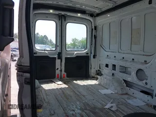 2018 Ford Transit with VIN 1FTYR2CM4JKA25671, listed as a IAAI auction lot 42086863 with 318,045 mi miles. Bid and sale history available at carsss.com. Image 8.